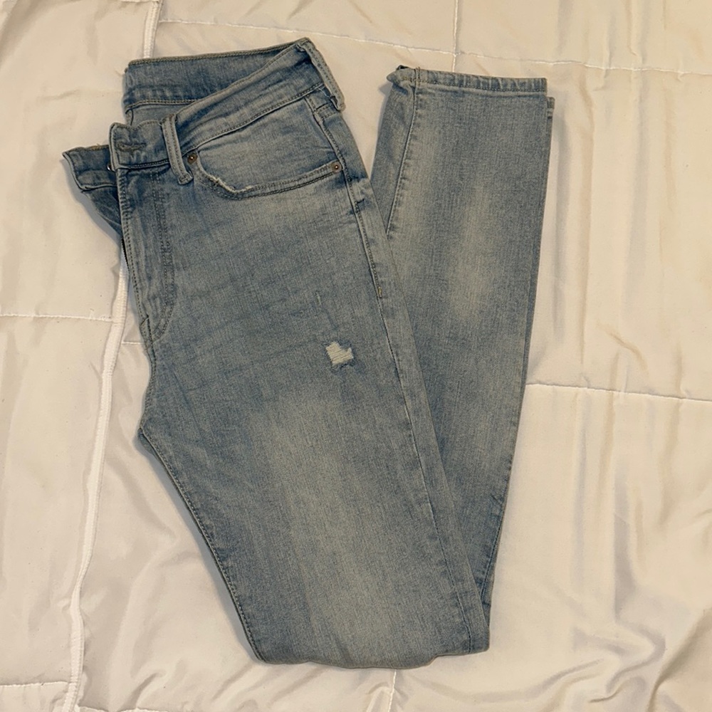 H&M blue distressed skinny jeans